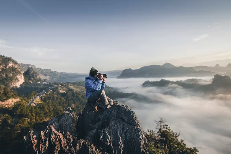 Landscape photographer with professional camera gear